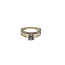 Medusa’s Light” – Two-Tone 10K Gold Greek Ring with Center Zirconia