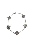 Bracelet en or blanc 10K avec petits trèfles blanc