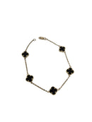 Bracelet en or 10K avec petits trèfles en  noir